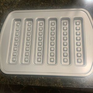 Pampered chef waffle stick pan.
